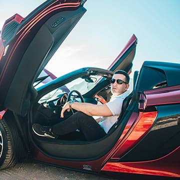 man sitting in a car